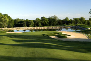 poundridge golf club on a bright sunny day, surrounded with luscious greens and trees